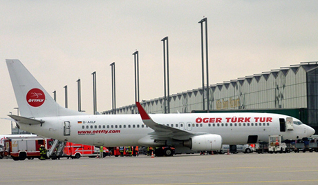 Na nemačkom aerodromu zapalio se avion, 11 povređenih