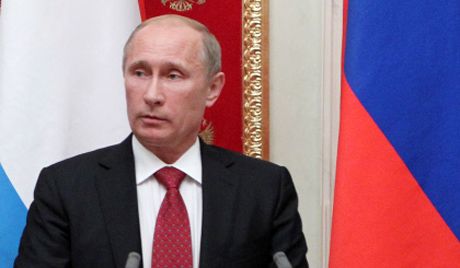 Путин поклонио Чавезу